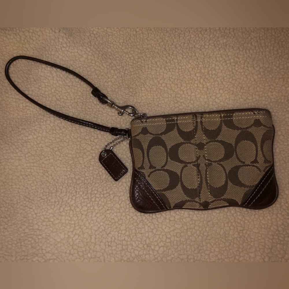 Coach wristlet- classic Signature textile jacquard with leather trim